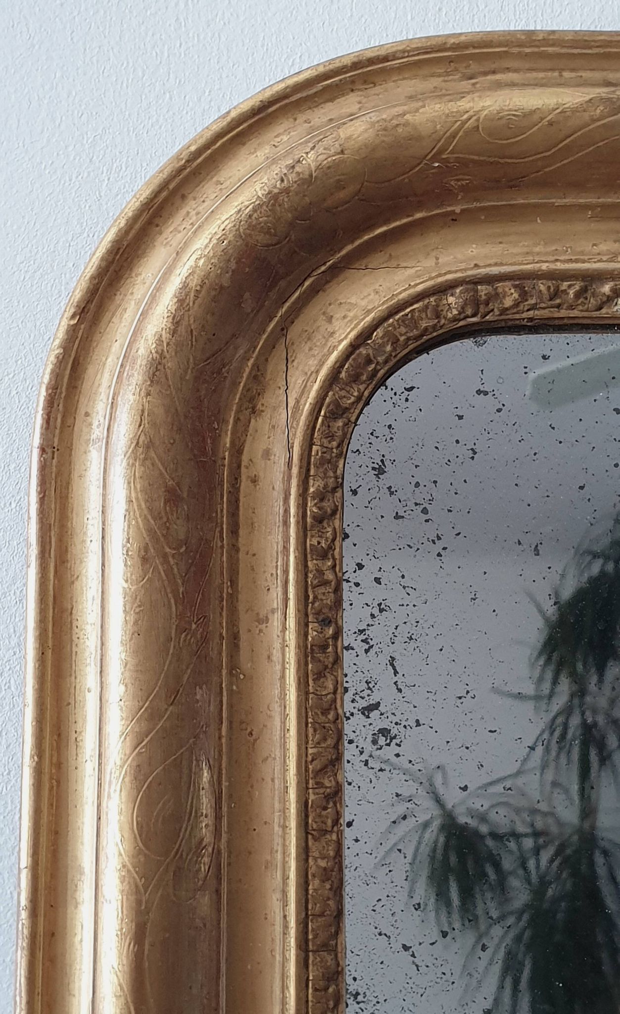 Old gilded mirror and old mercury glass - wall mirror with gold leaf