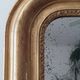 Old gilded mirror and old mercury glass - wall mirror with gold leaf