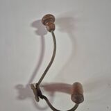 Vintage 1960s wall coat rack in wood and metal.