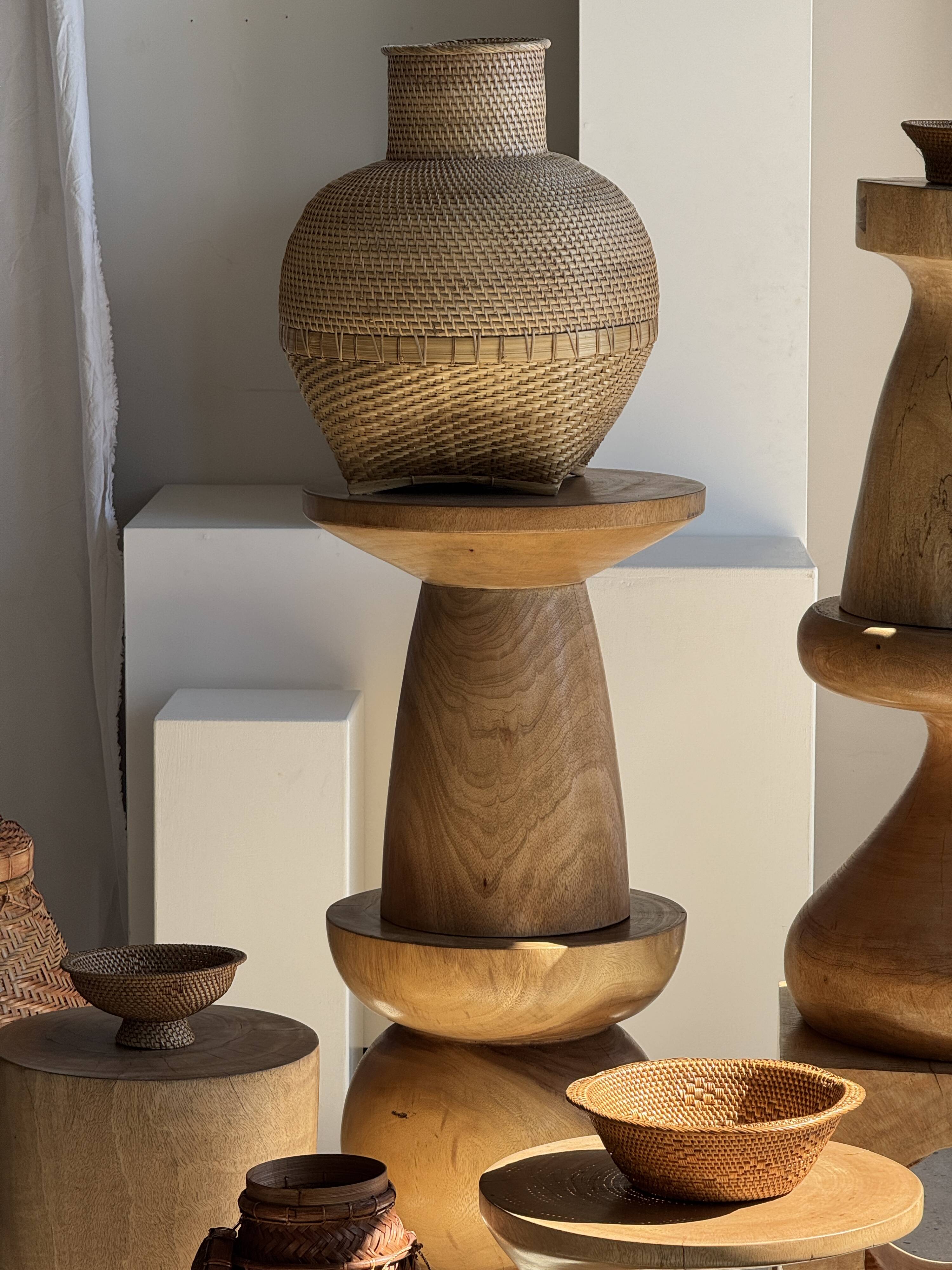 Natural solid mango side table (monoxyle) with conical legs.