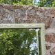 Large antique bevelled mirror in carved solid wood, green lizard – 129 × 75
