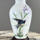 Pair of porcelain vases by Franklin, “The Meadowland Bird Vase”, 20th century.