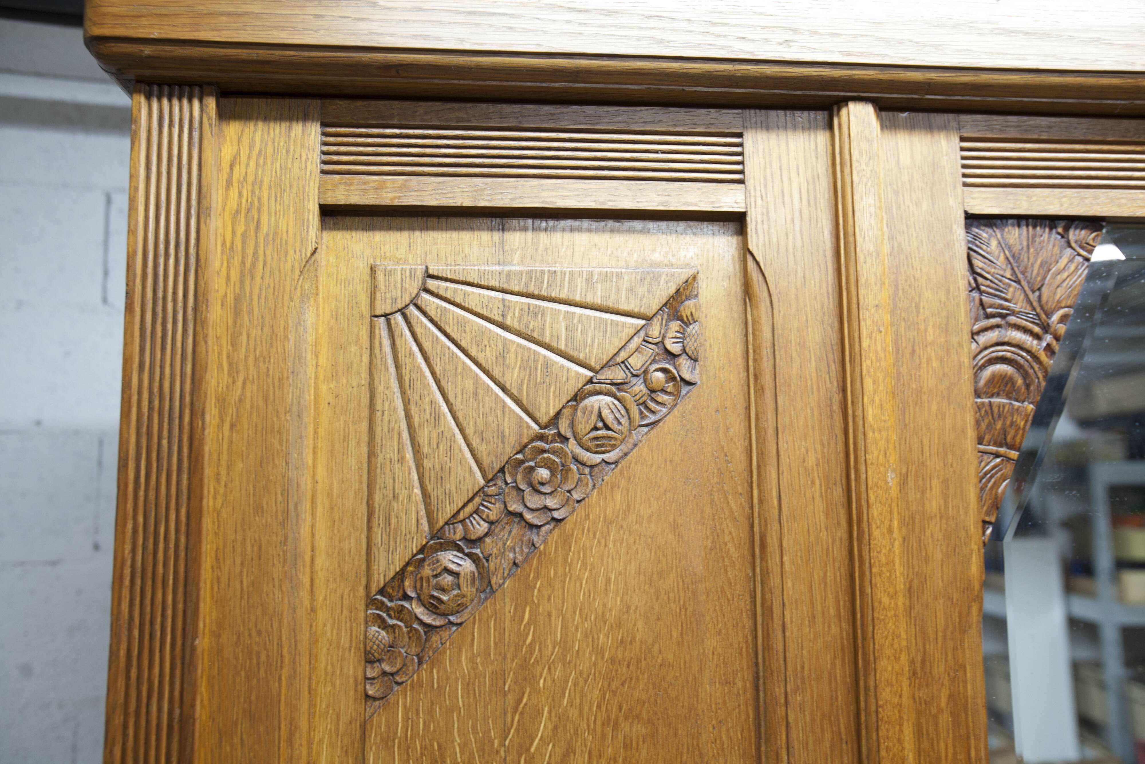 Art Deco carved oak wardrobe - Flemish workshop circa 1930