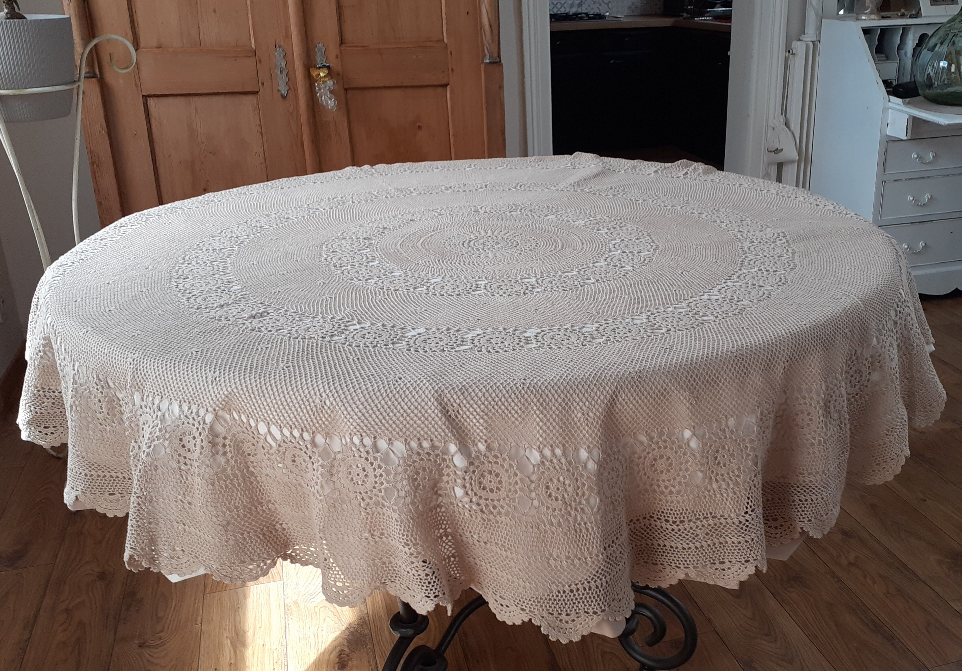 Old crochet round tablecloth with matching napkins