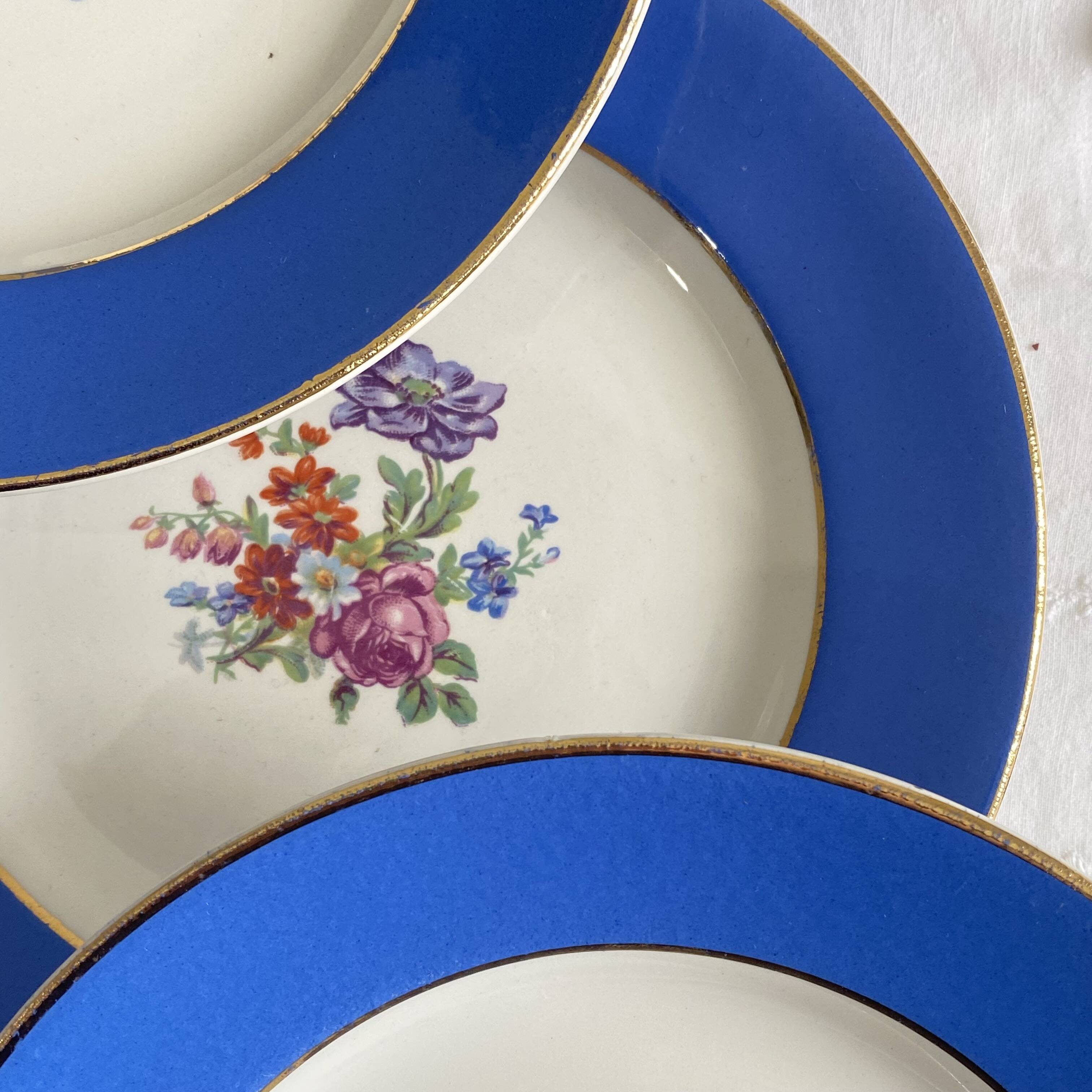 6 antique blue ceramic dessert plates with flowers and gilding from Saint Amand Hamage.