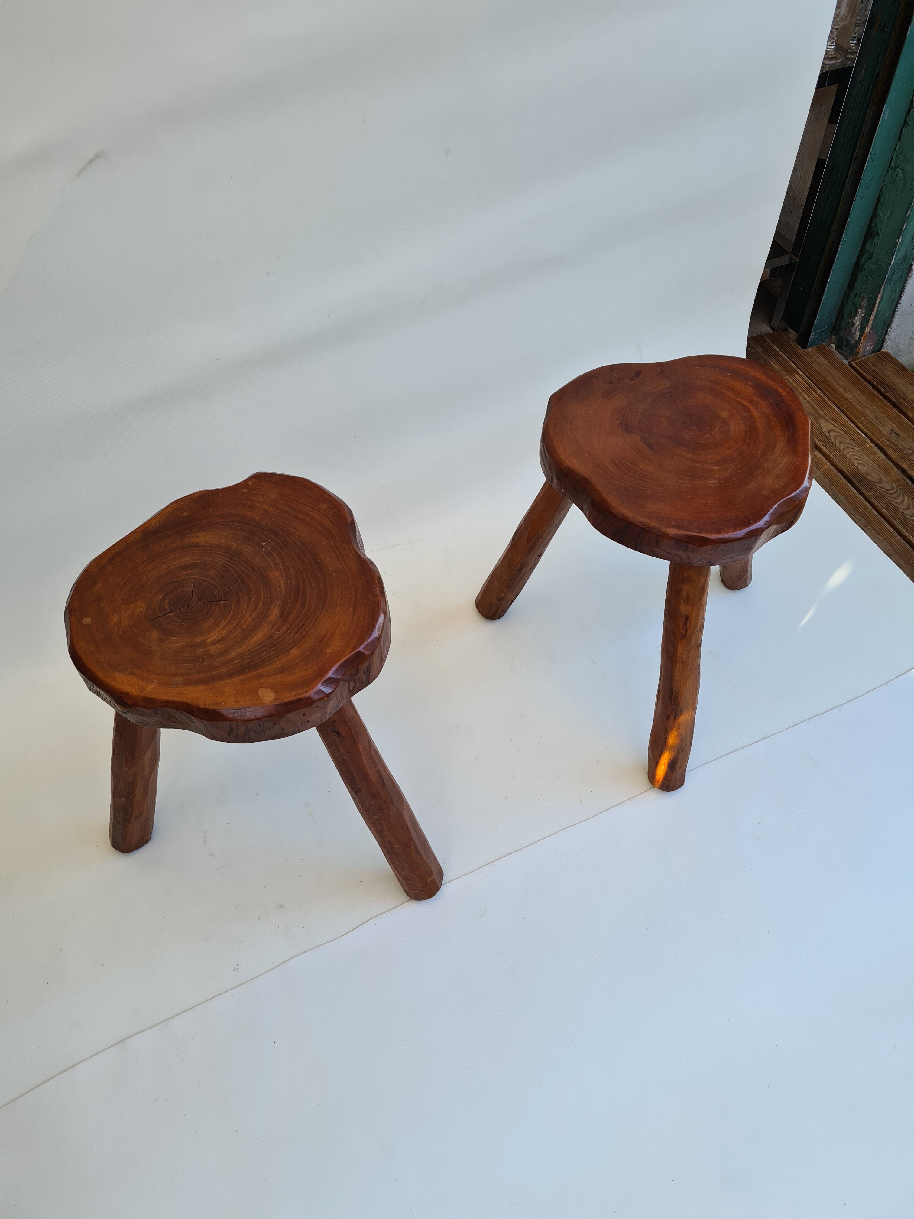 Pair of elm tripod stools