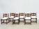 Ensemble de six chaises de salle à manger brutalistes à dossier arqué