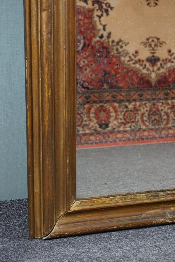 Old French fireplace mirror with beautiful ornament