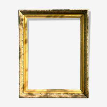 large molded frame gilded wood and stucco