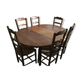 Dining room table with 3 extension cords and 6 chairs