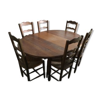Dining room table with 3 extension cords and 6 chairs