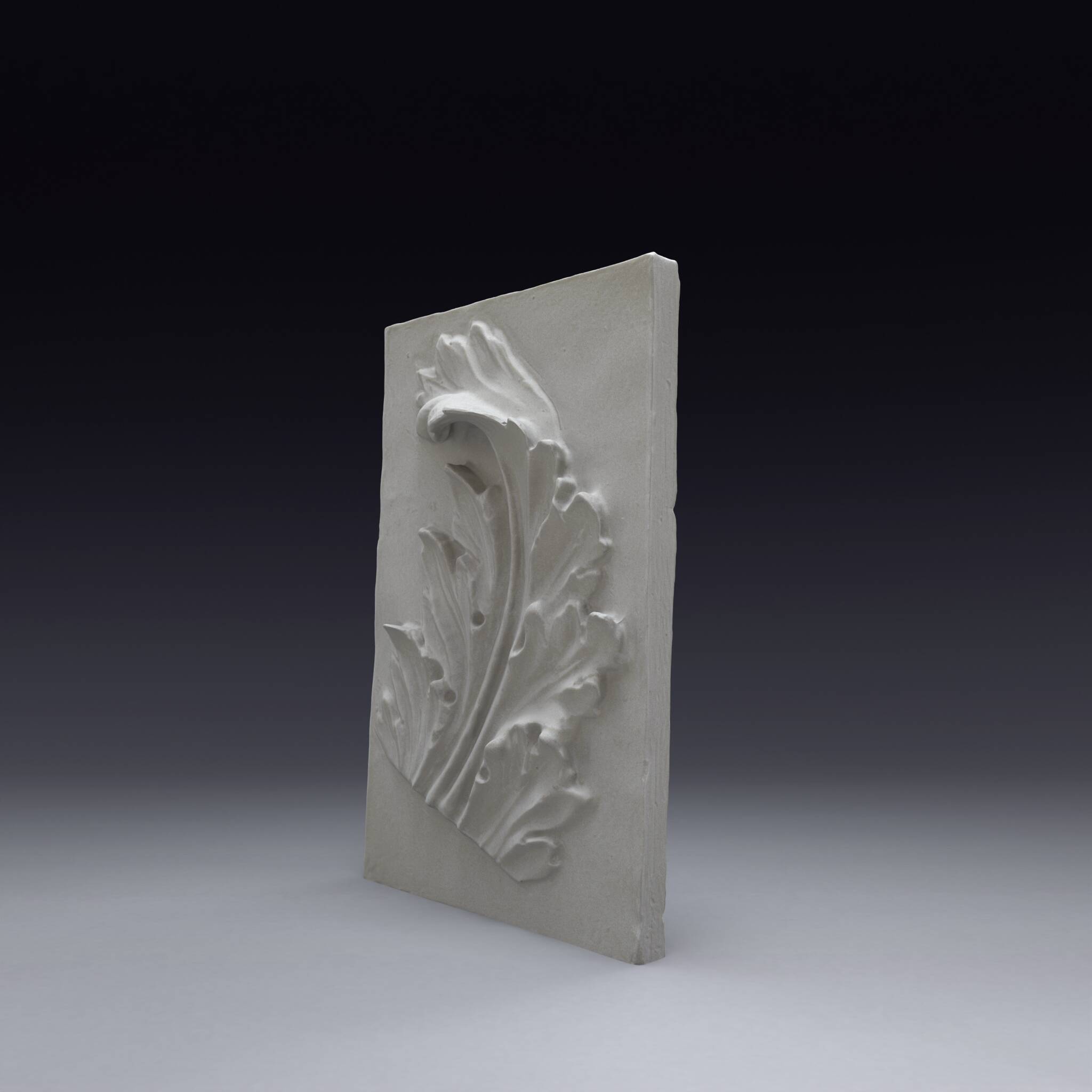 Plaster bas-relief depicting an acanthus leaf, inspired by Roman art.