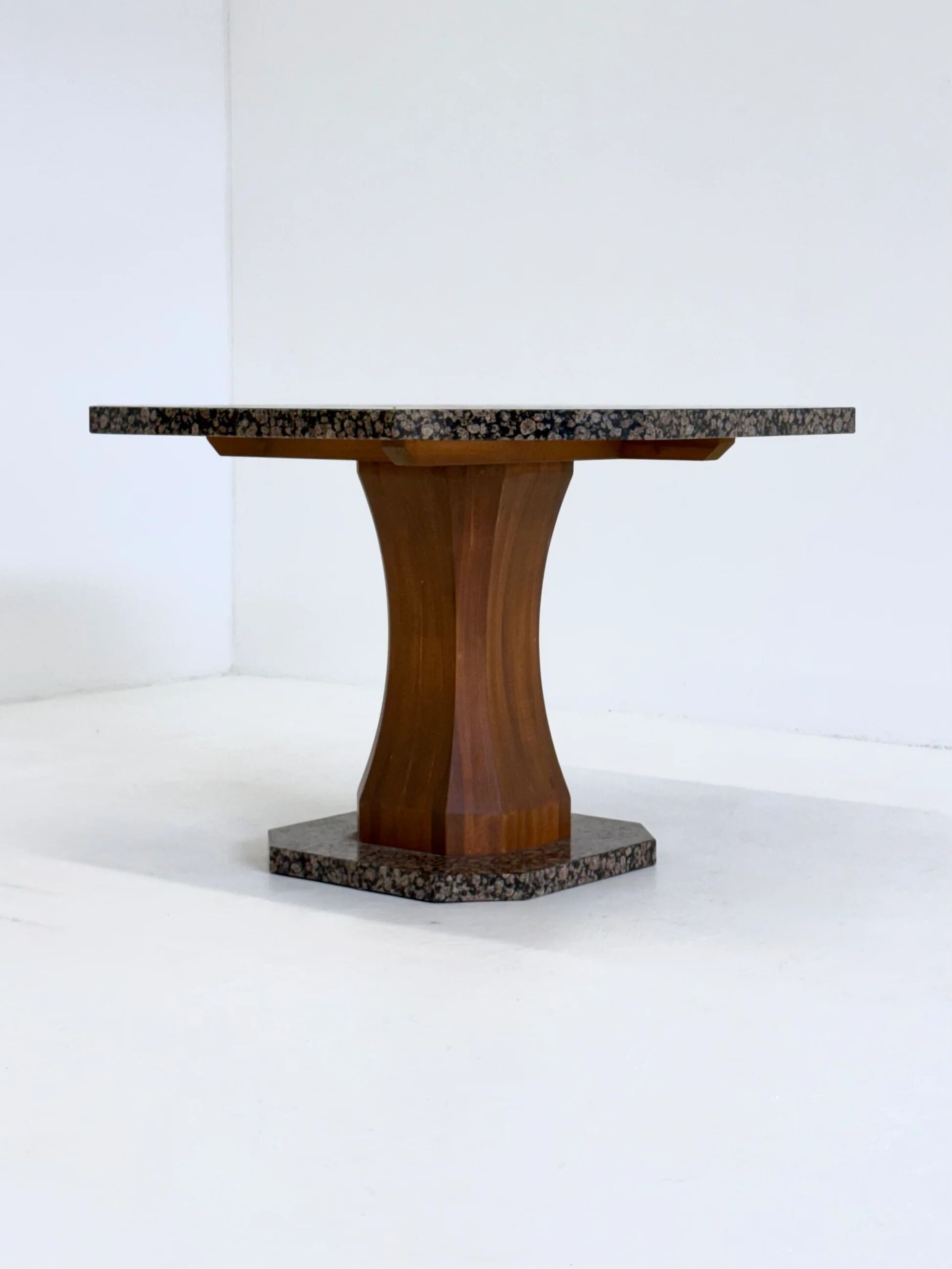 Art Deco dining table with octagonal granite top