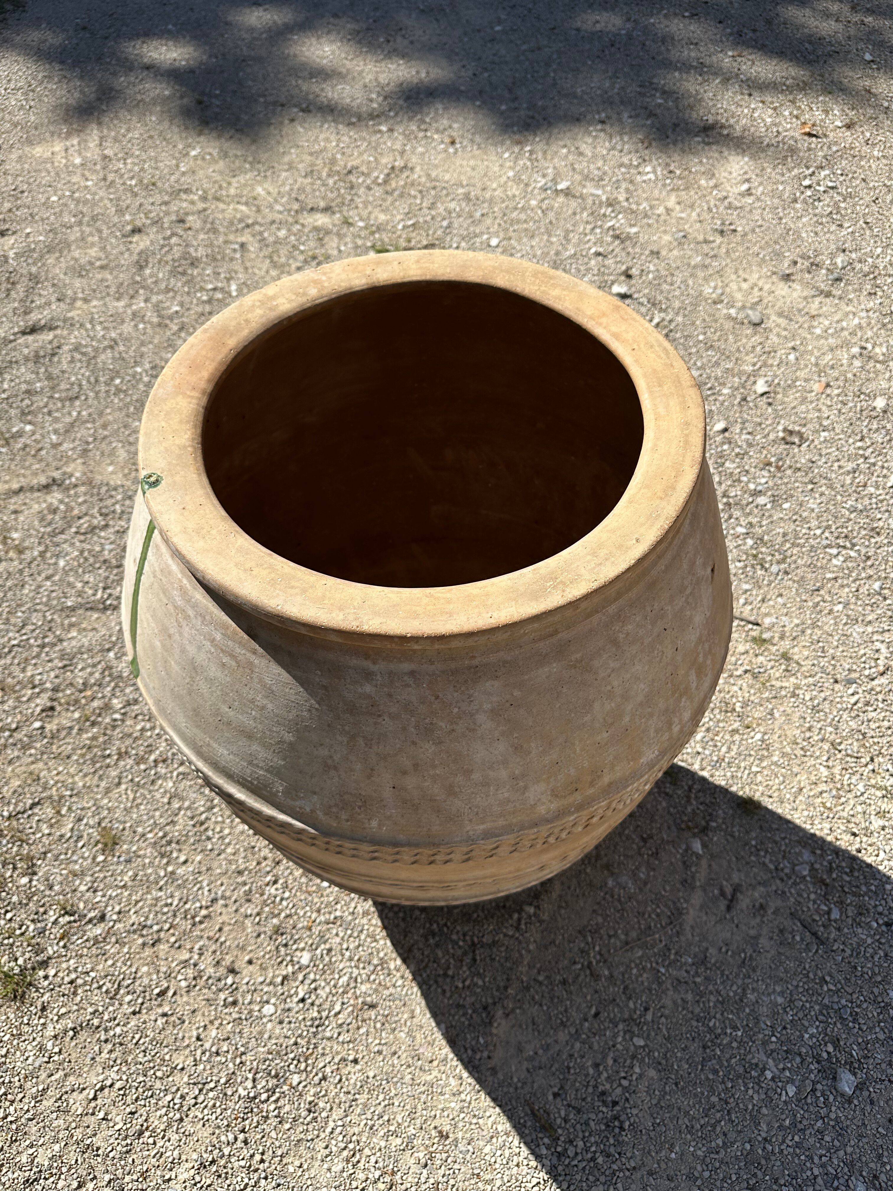 Ancient terracotta pottery jar from the 19th century.