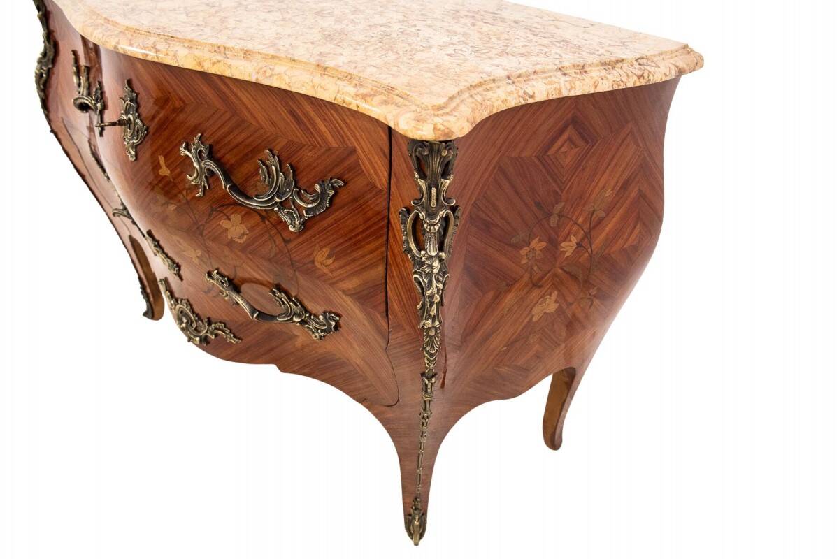 Inlaid chest of drawers with a marble top in the Louis XV style, France