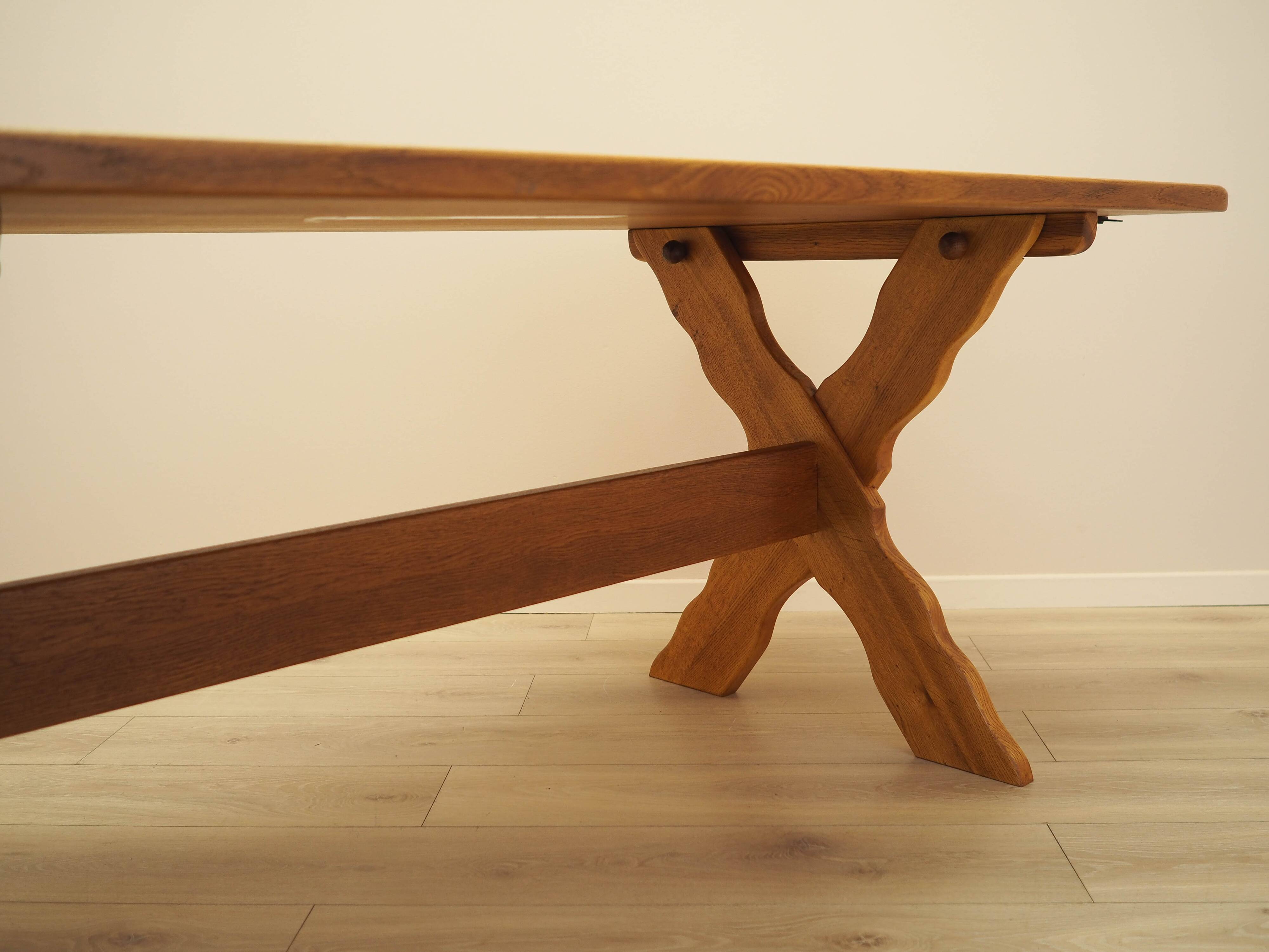 Solid oak dining table by Henning Kjærnulf, Denmark, 1960s