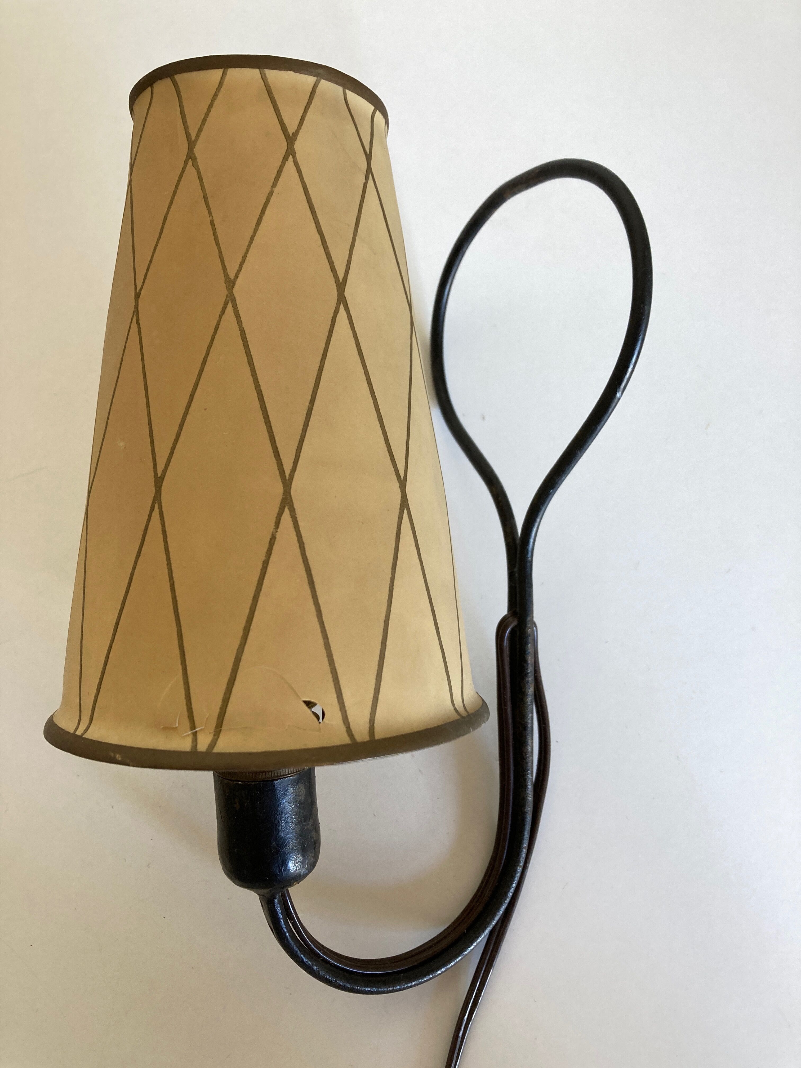 Art deco beaten iron wall lamp