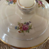 Old teapot or coffee maker in English style.