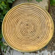 Large wicker basket in rush and brass in the style of Gabriella Crespi from the 1960s.