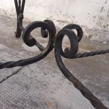 Round coffee table in wrought iron and on marble