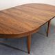 Scandinavian extendable round table in rosewood, 60s-70s