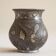 Antique pyriform Bidri vase in the shape of a pyramid.