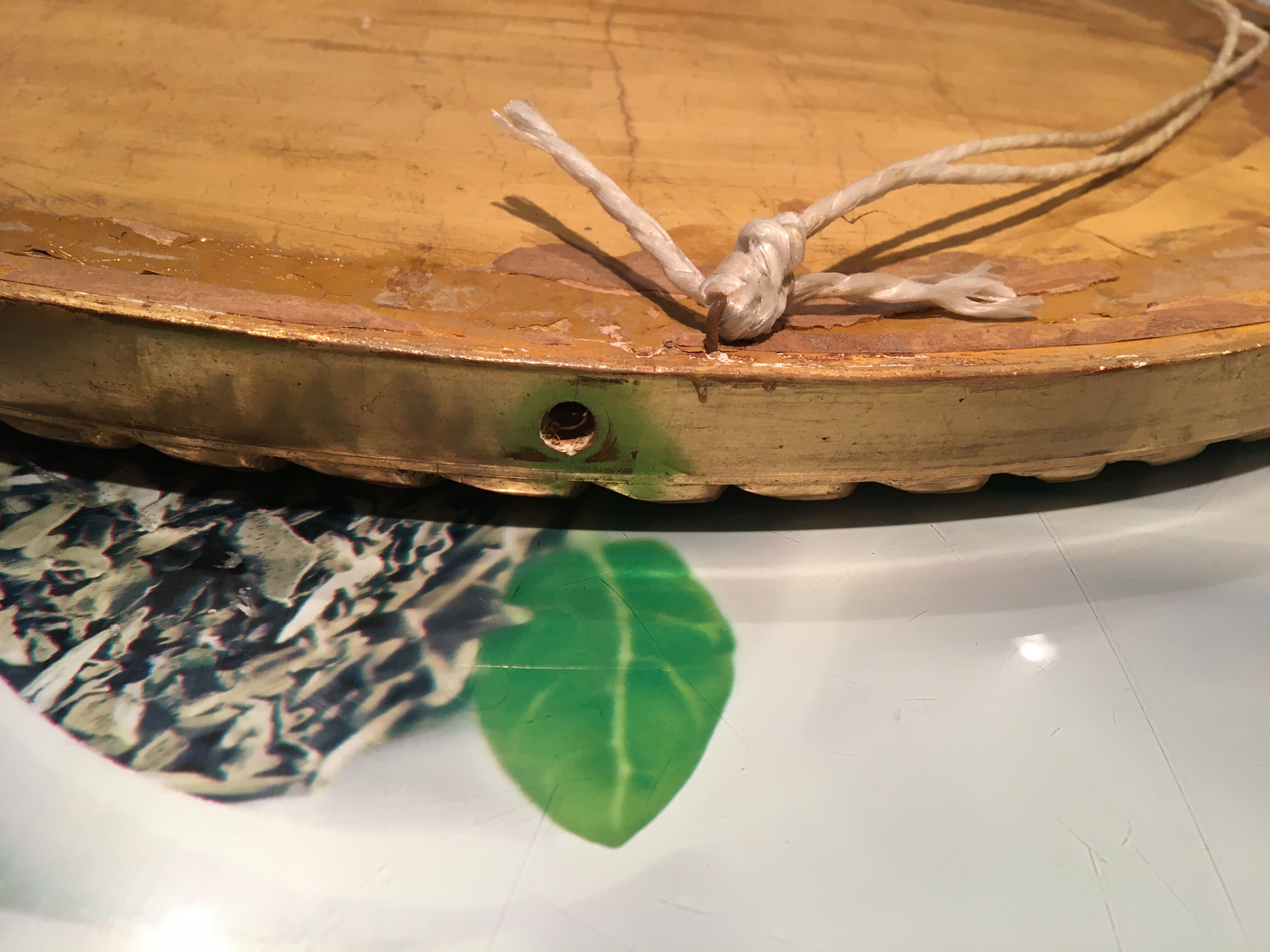 Bevelled golden oval mirror 40x51cm