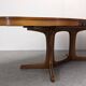 Oval extendable dining table by Baumann, France circa 1970.