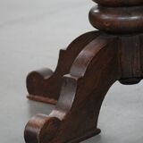 Elegant antique sheepskin leather desk chair with a heavy wooden frame