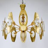 Oscar Torlasco brass chandelier of 25 inches with optical prism lenses, Italy, 1970s.