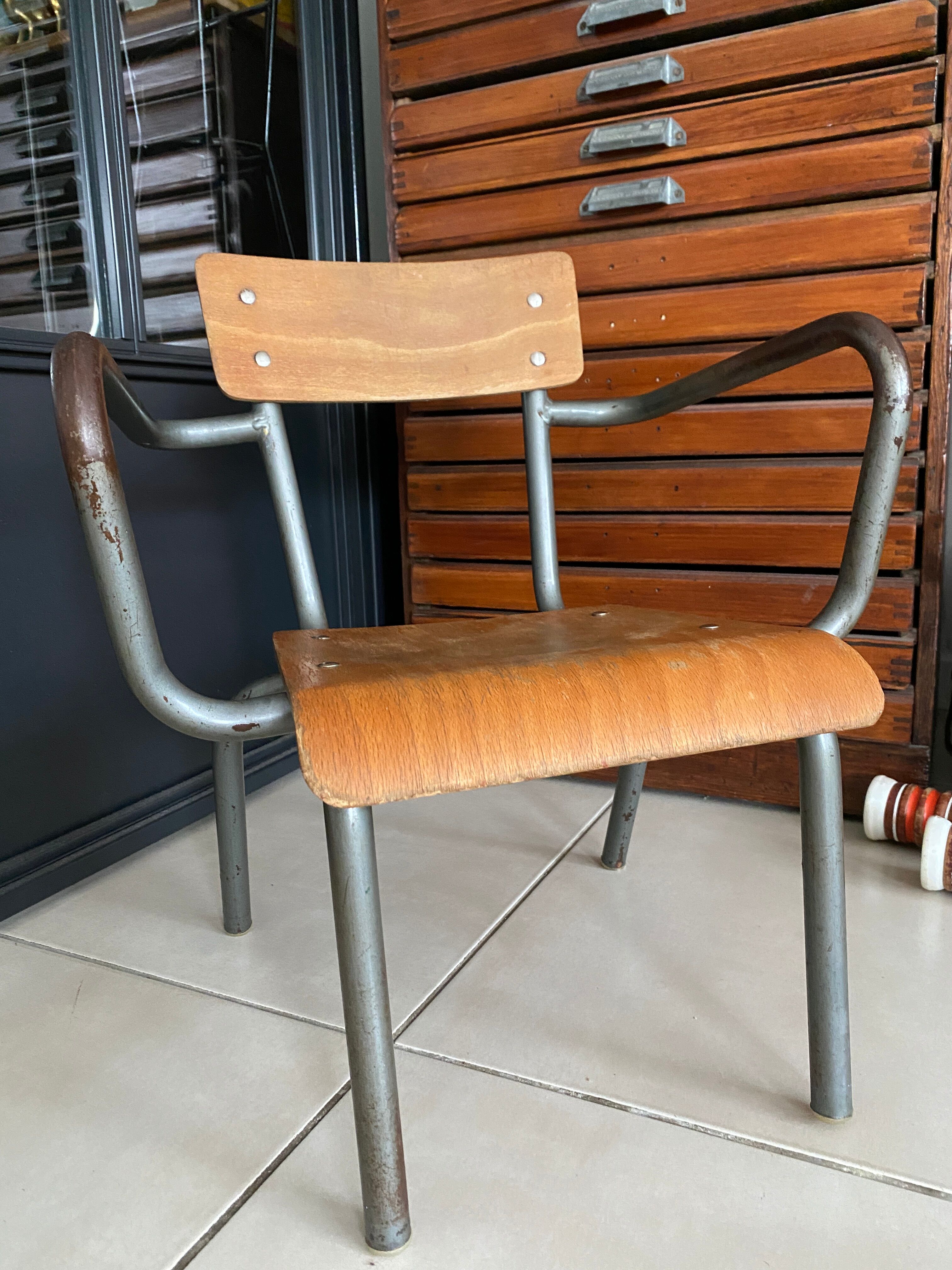 Old Mullca school chair with armrests