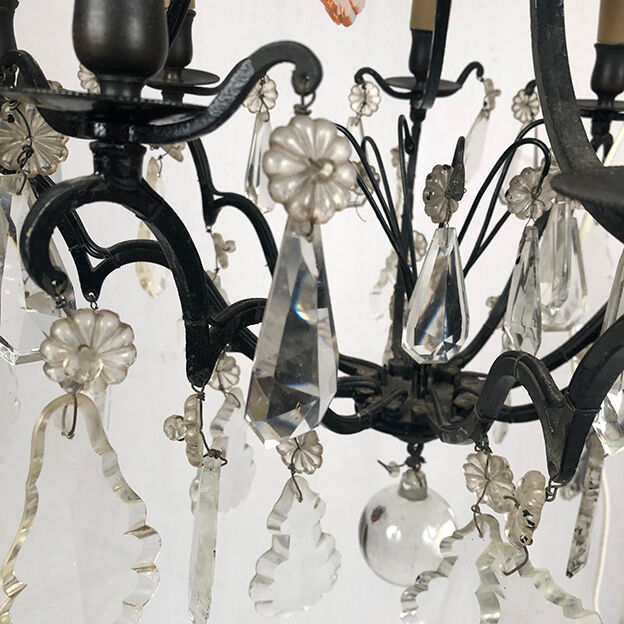 Black lacquered metal chandelier and crystal tassels