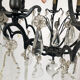 Black lacquered metal chandelier and crystal tassels