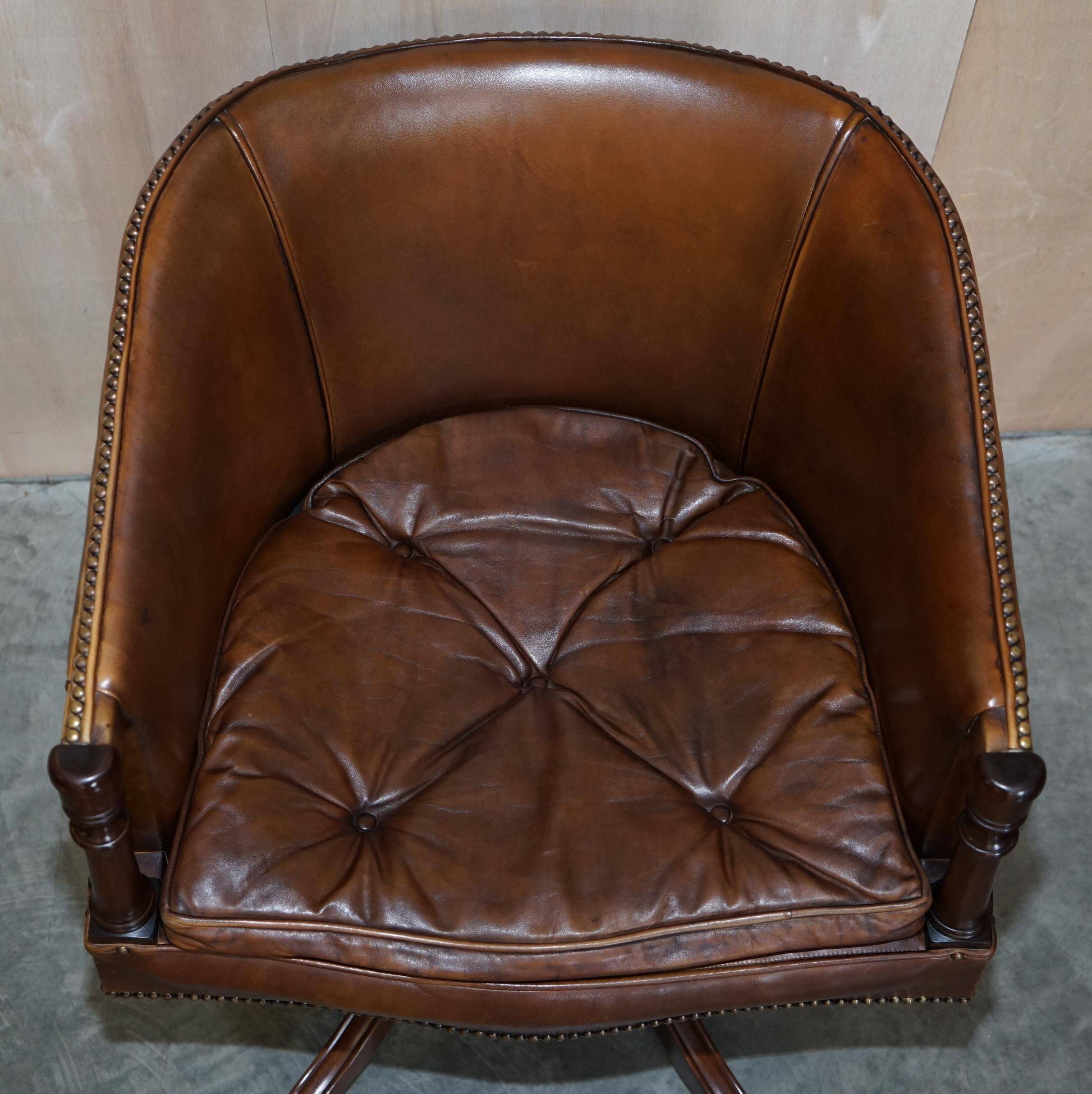 Vintage Patinated Leather Chesterfield Swivel Captain's Armchair