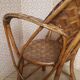 Old chair in braided chestnut
