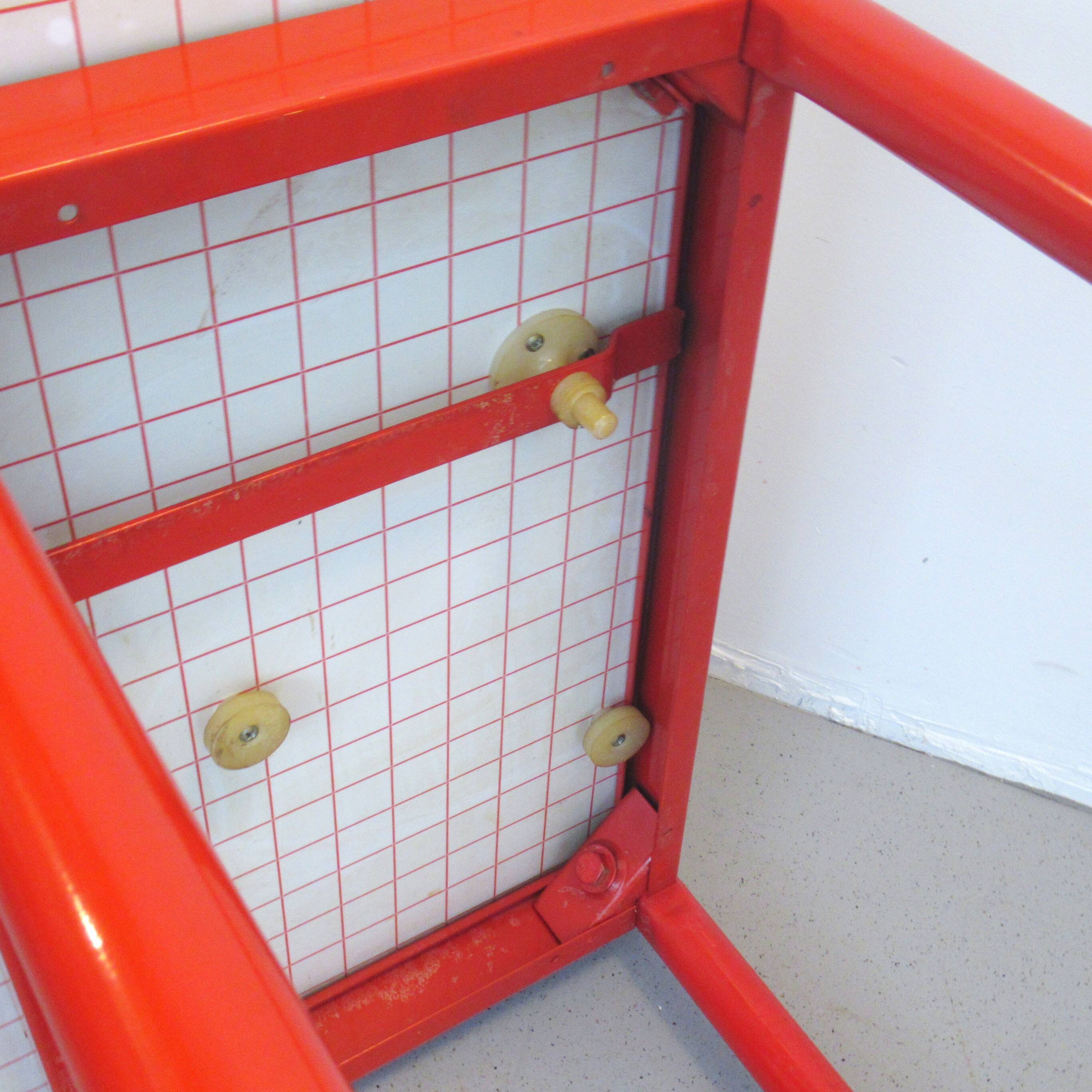 Foldable table with red checkered pattern from the 80s.