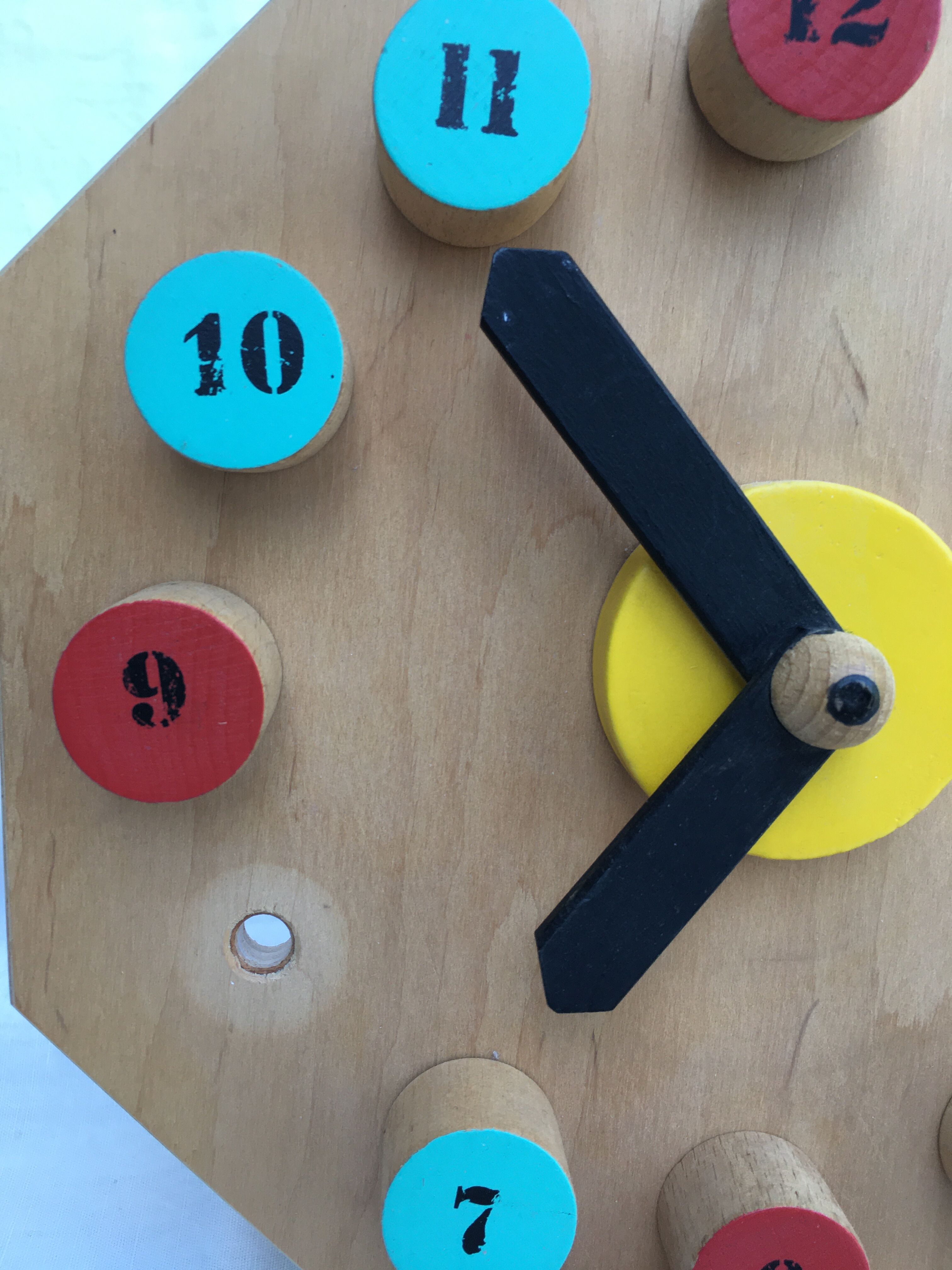Painted wooden toy clock