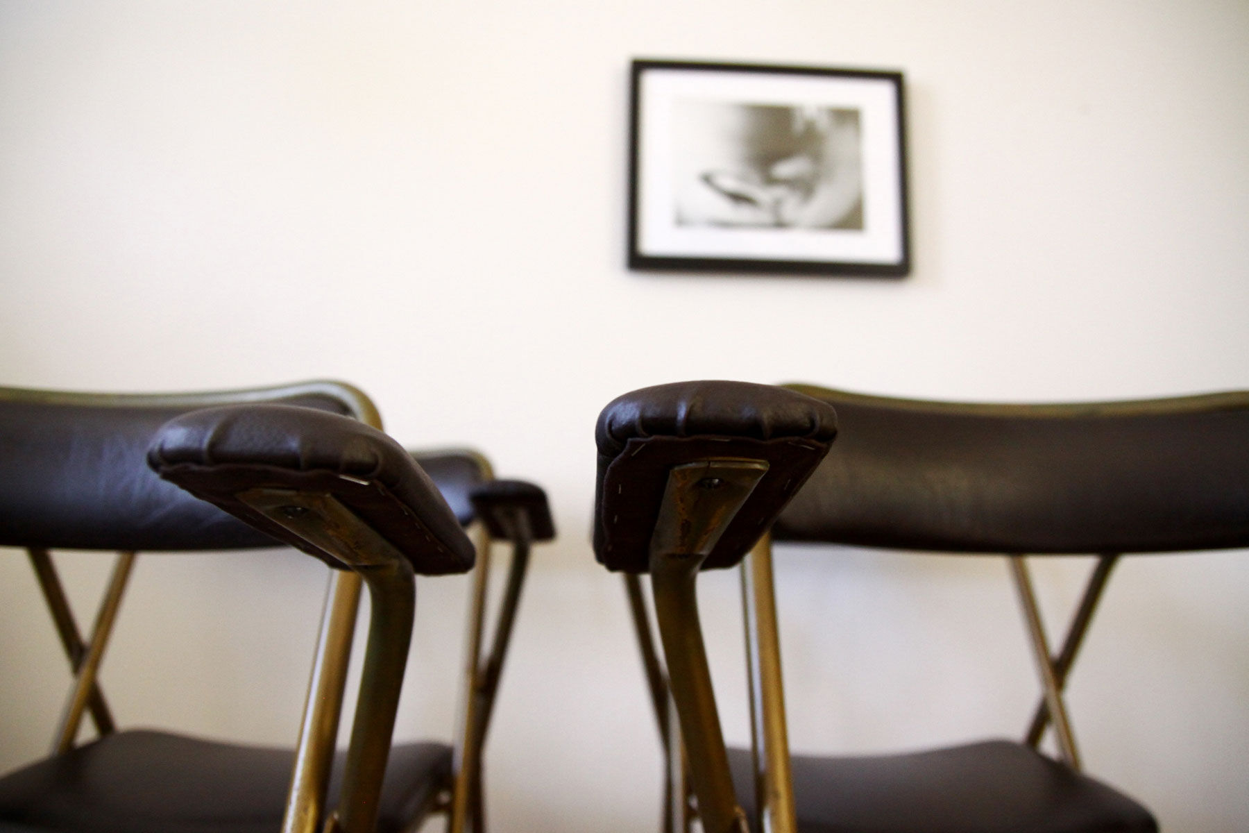 Lot of 4 metal and skai folding chairs