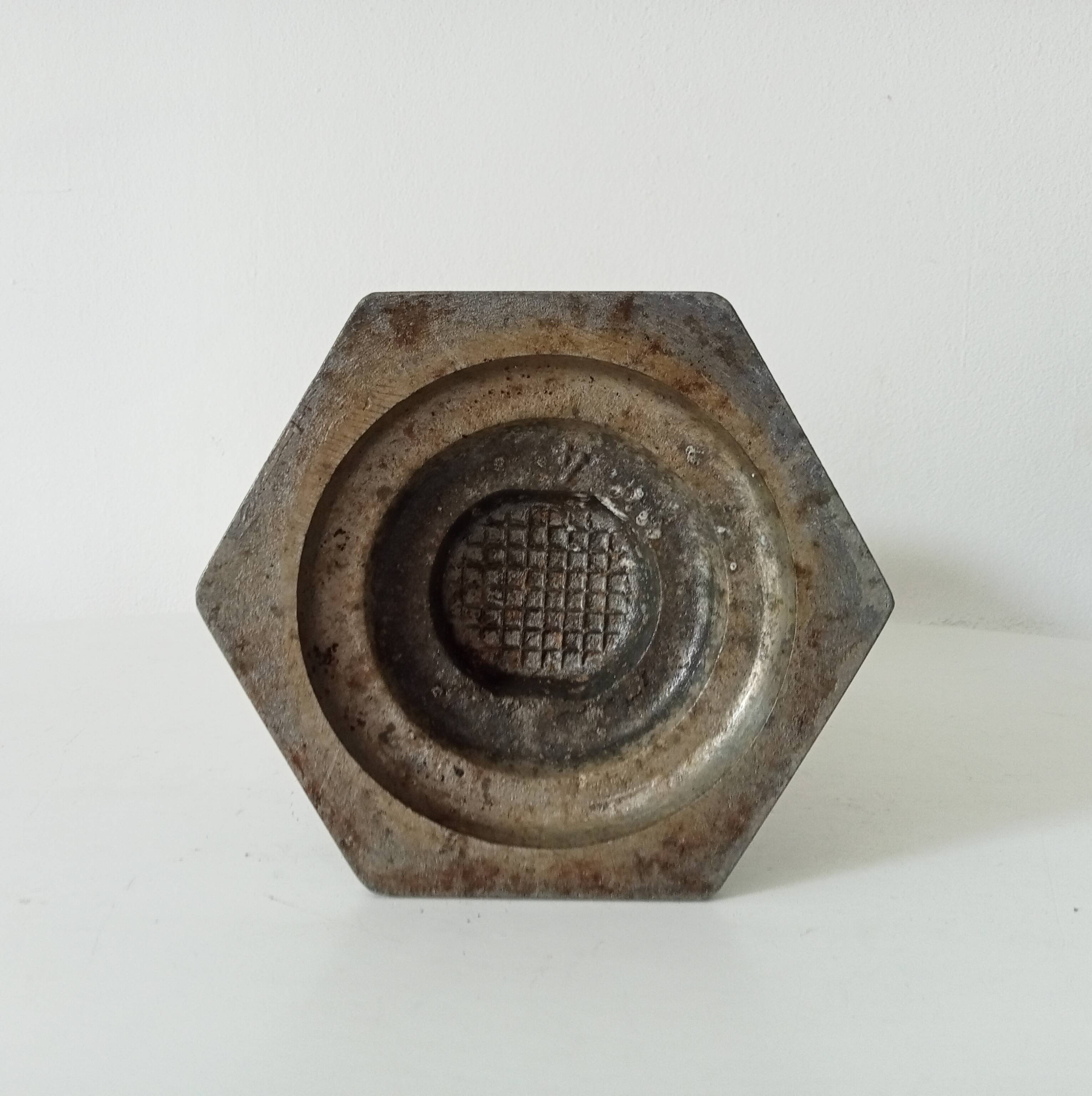 Old art deco vase in cast aluminum