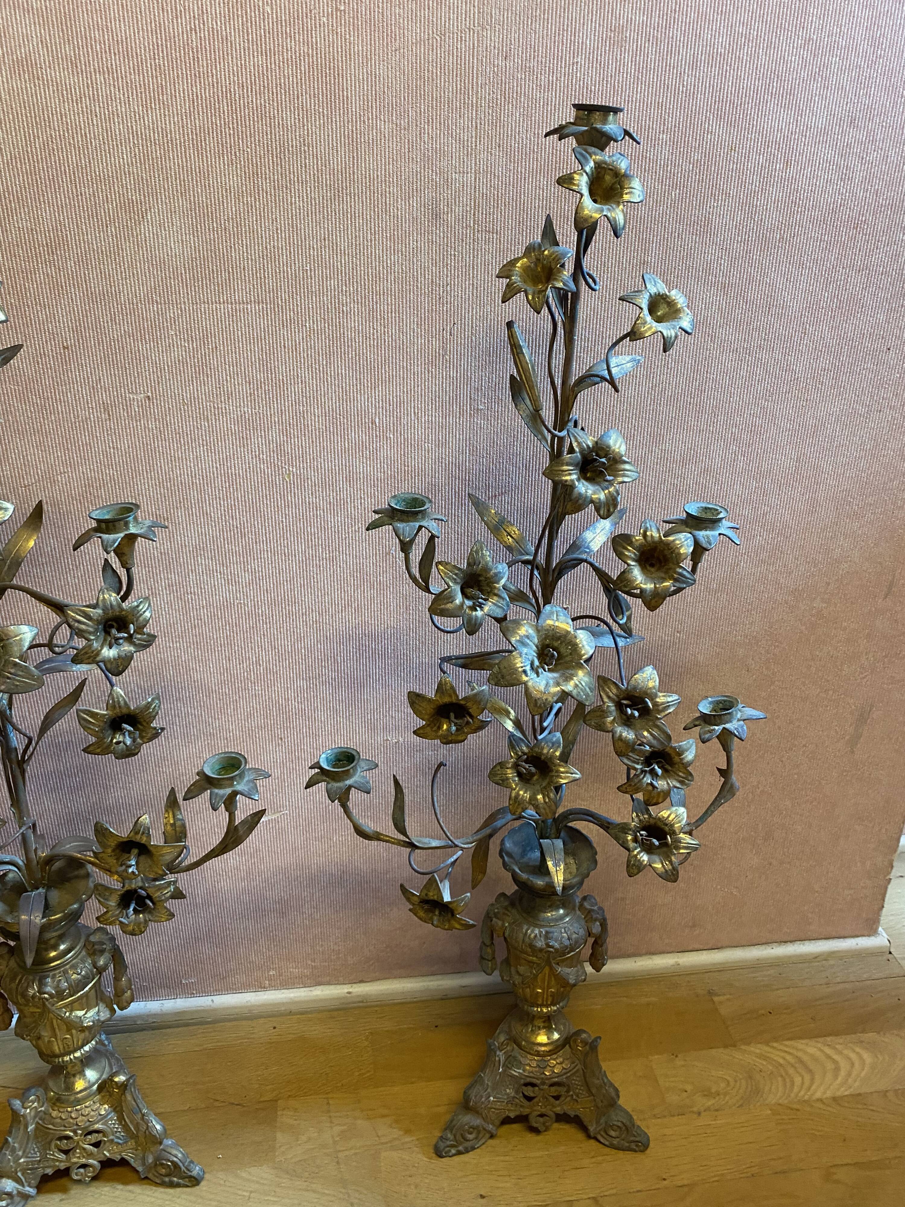 Pair of gilded bronze church candelabras.