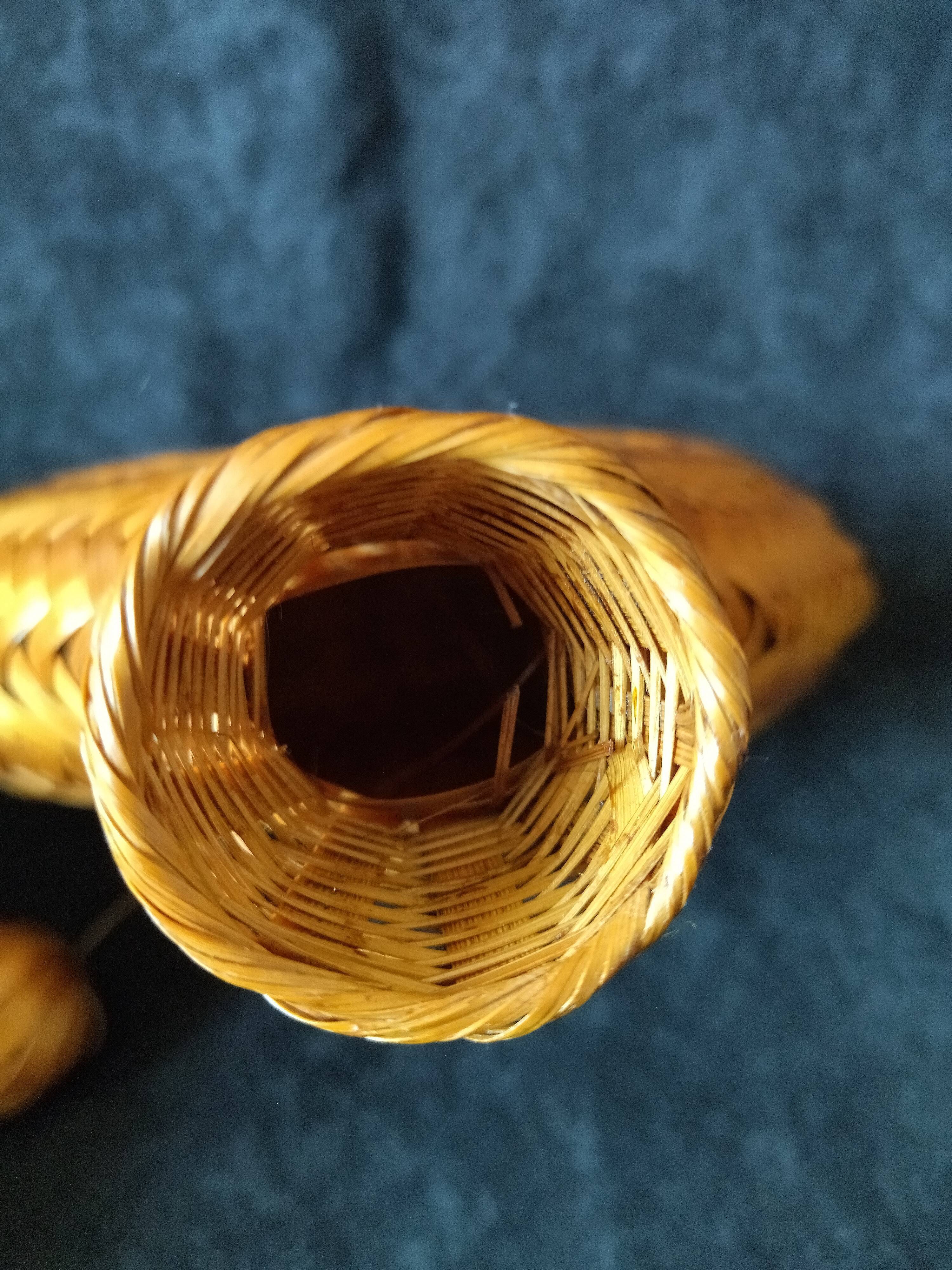 Vintage wicker and braided bamboo bottle