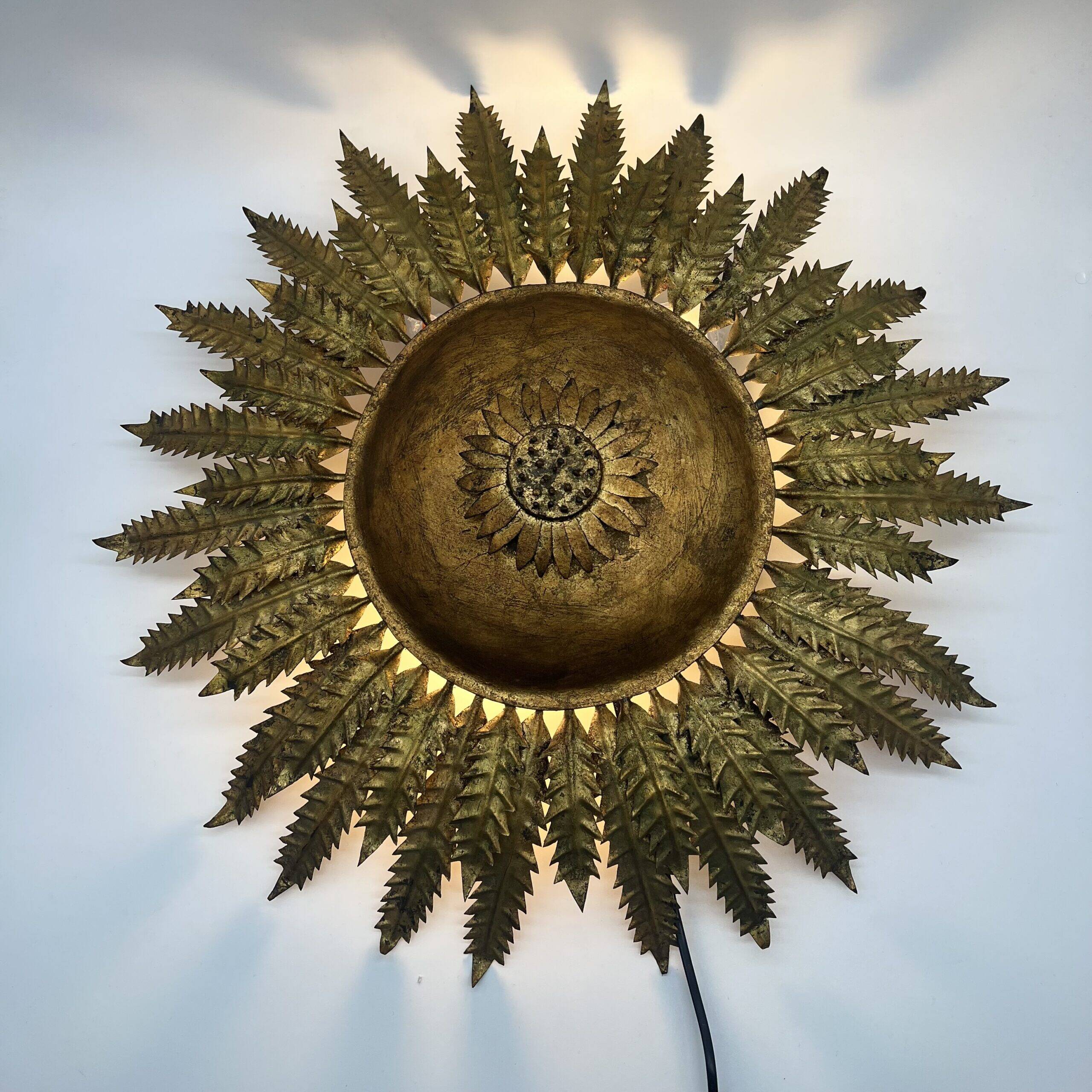 Large wall sconce "Sol" in gilded wrought iron – Spain, 1950s