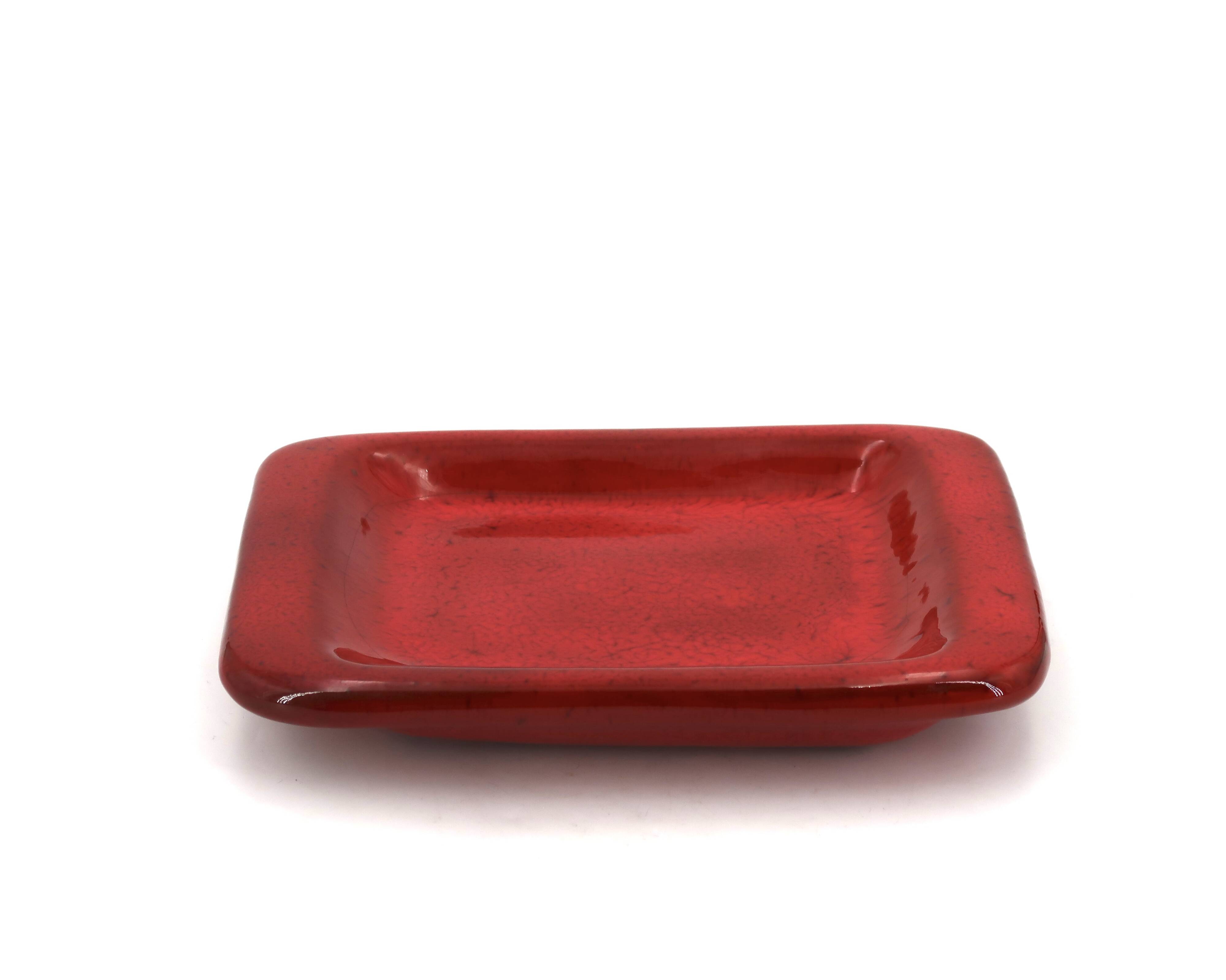 Rectangular ceramic catchall in red by Jean and Robert Cloutier.