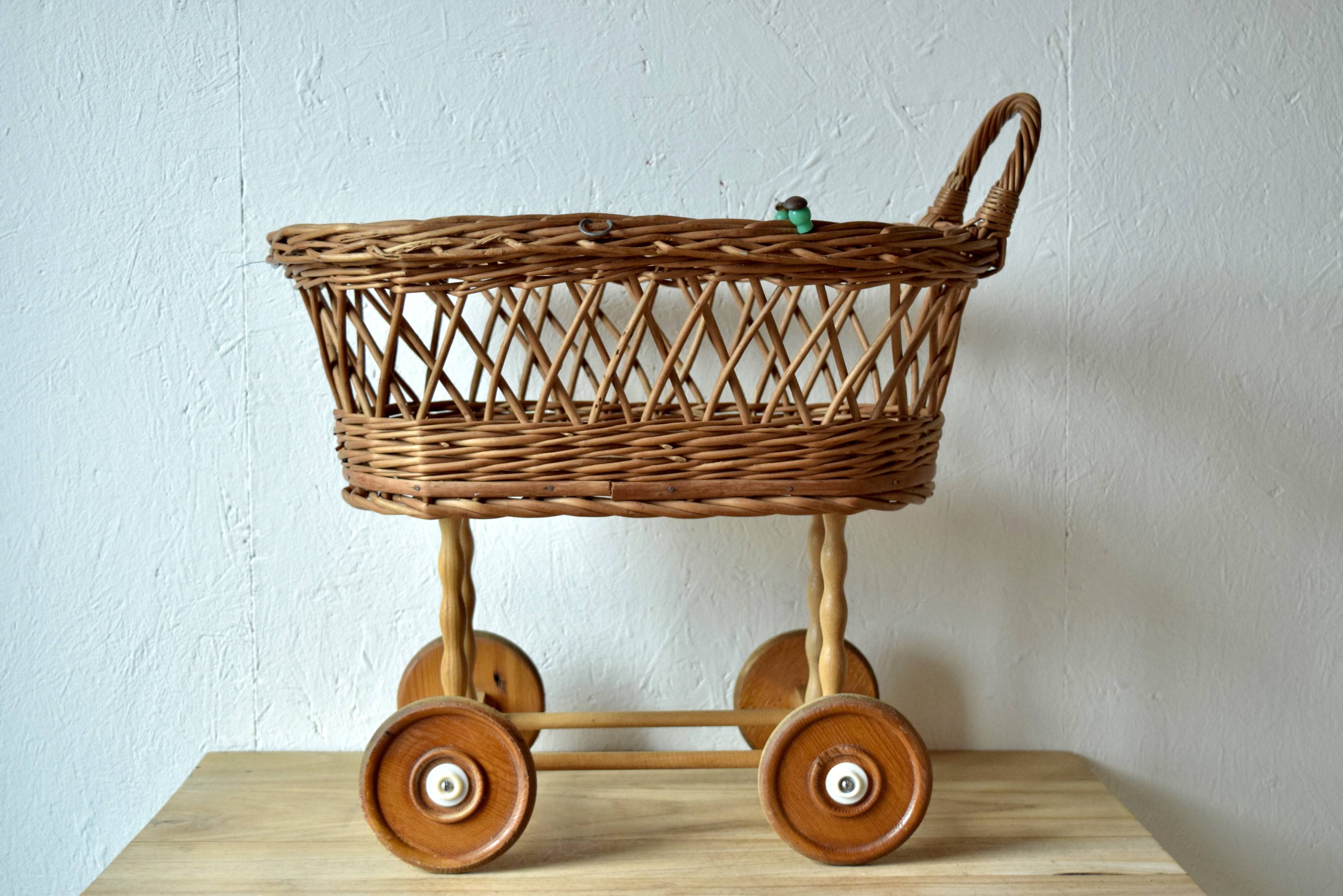 Old dolls pram - wooden wheels
