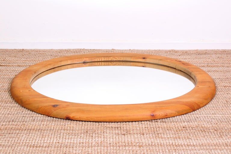 Mid-century oval mirror in solid pine Sweden 1960s 120x95cm