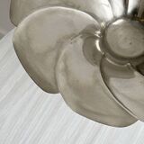 large dish on a shiny metal stand