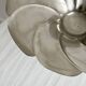 large dish on a shiny metal stand