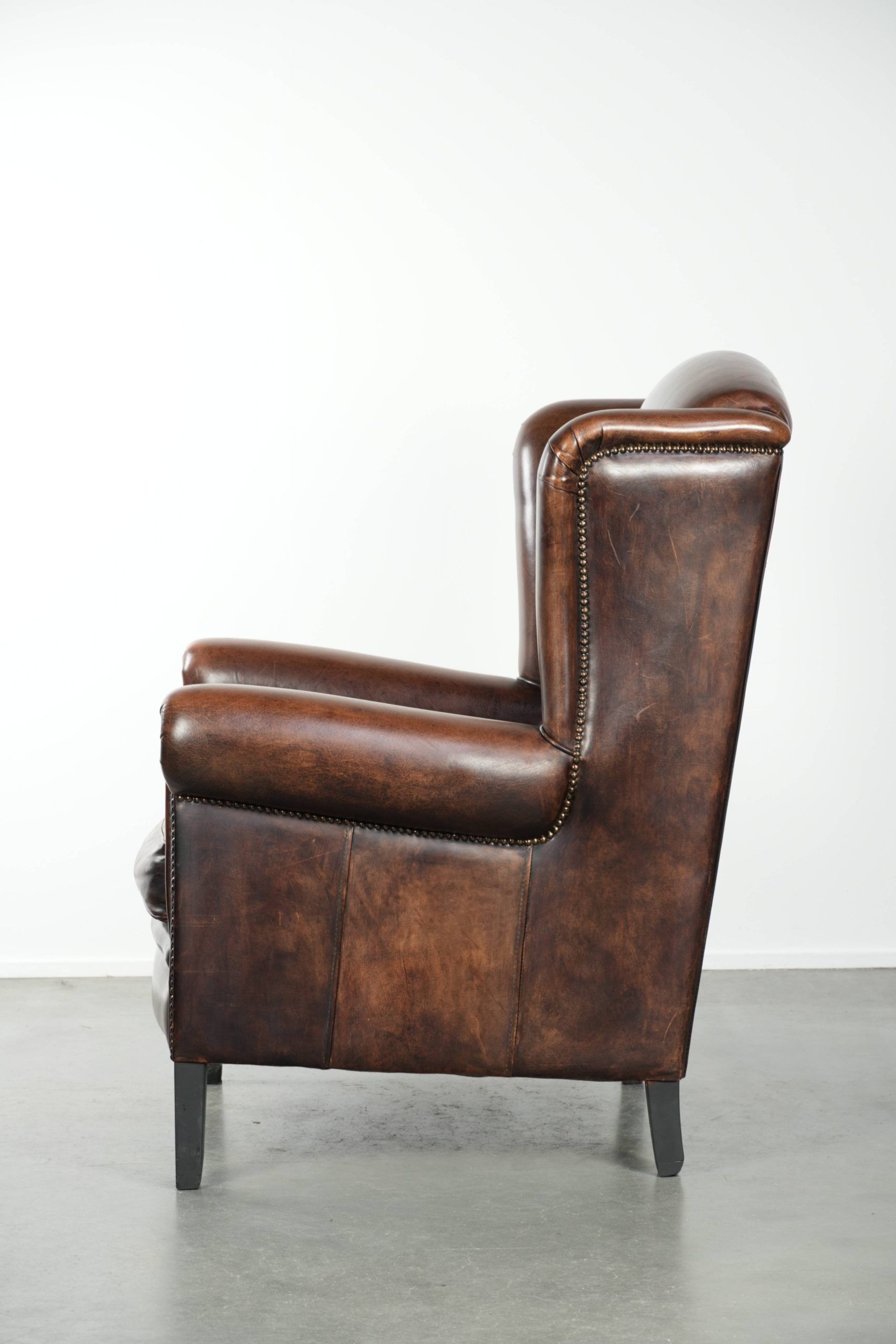 Sheepskin wingback armchair with beautiful deep and warm colours