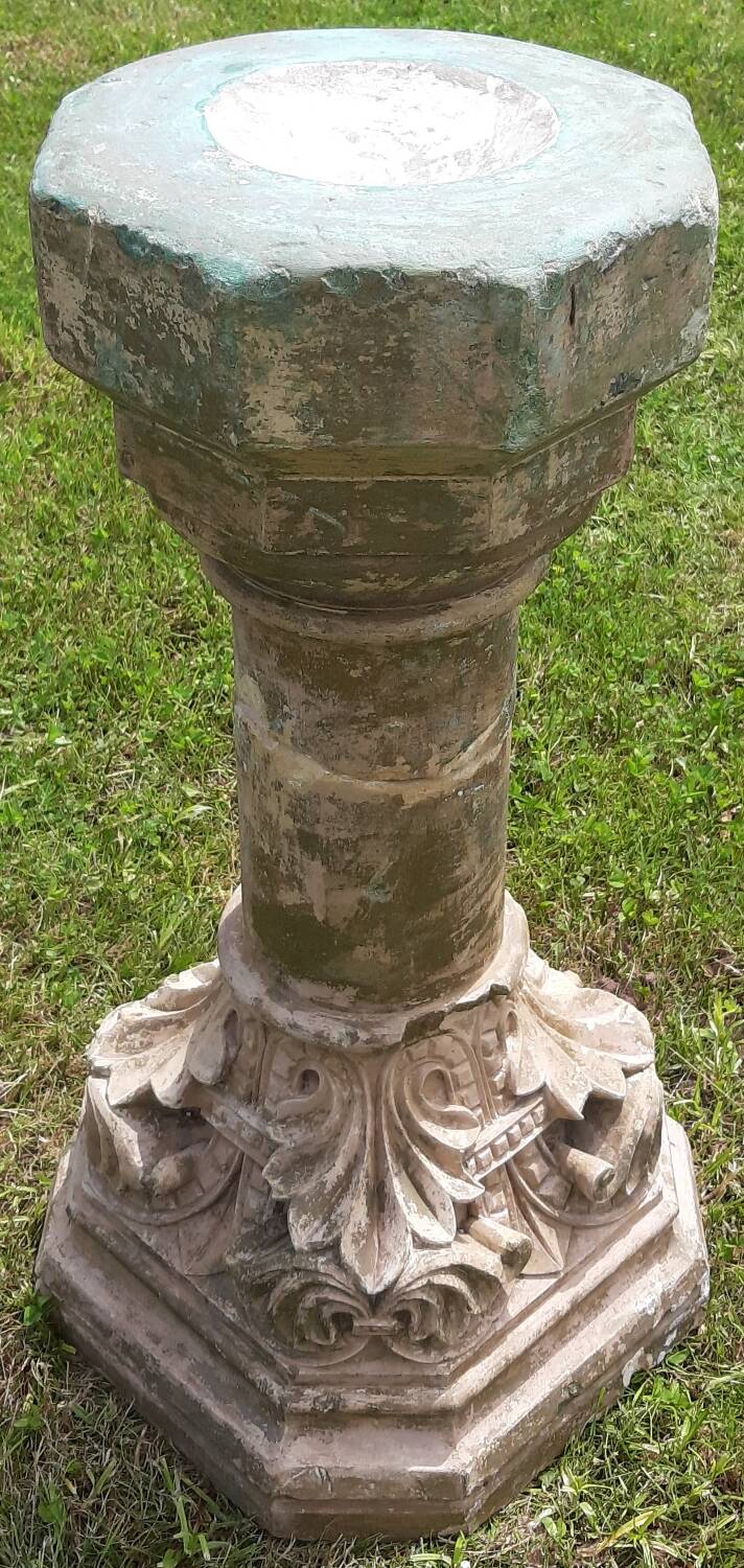Holy water font on stone column (17th century)