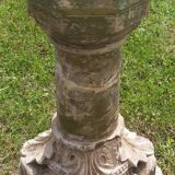 Holy water font on stone column (17th century)
